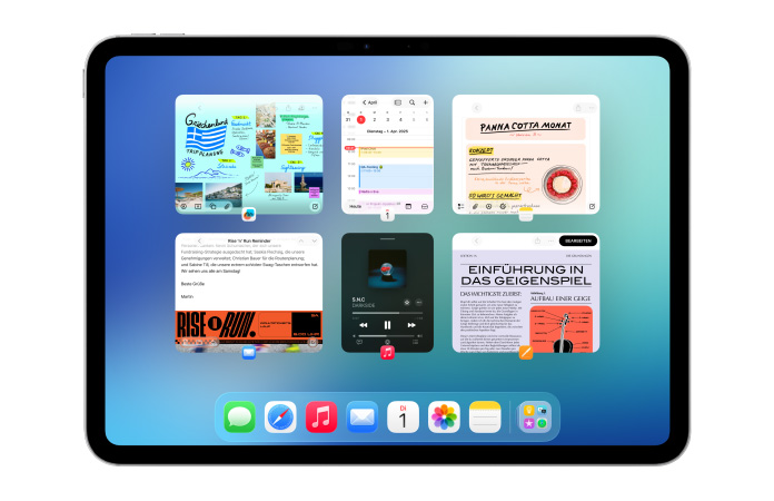 Ein iPad im Querformat zeigt sechs geöffnete Fenster in zwei Reihen an, darunter die Apps Kalender, Notizen, Apple Music und Safari