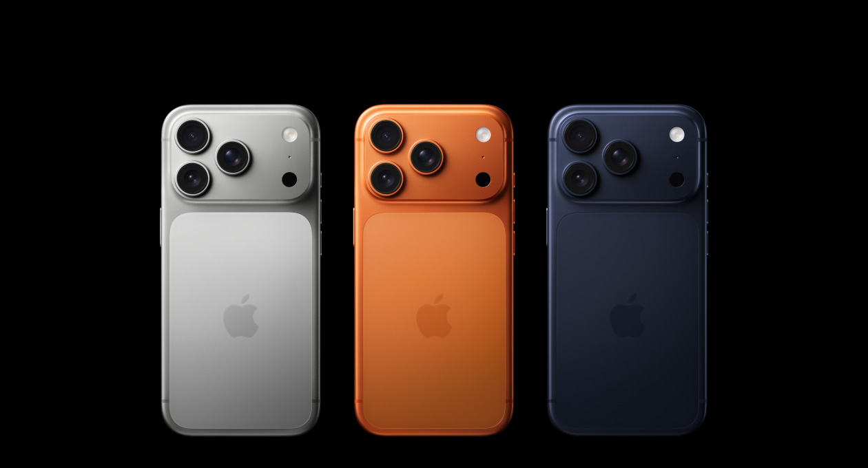 iPhone 17 Pro, back exterior, all three finishes, Silver, Cosmic Orange, Deep Blue, Pro camera system in top left corner, three lenses, microphone, flash, Apple logo in centre