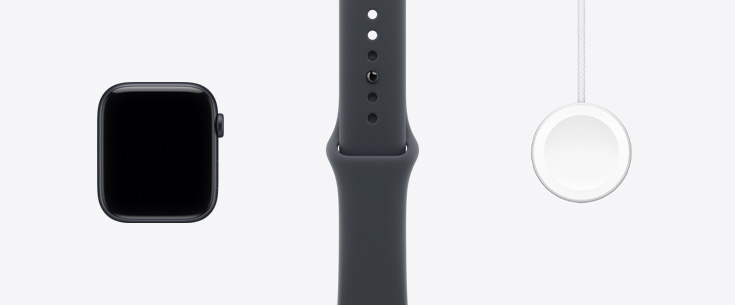 Apple Watch SE 3，午夜暗色鋁金屬錶殼，正面外觀，展示貼邊設計顯示器，午夜暗色運動錶帶，Apple Watch 磁力快速充電器至 USB-C 連接線