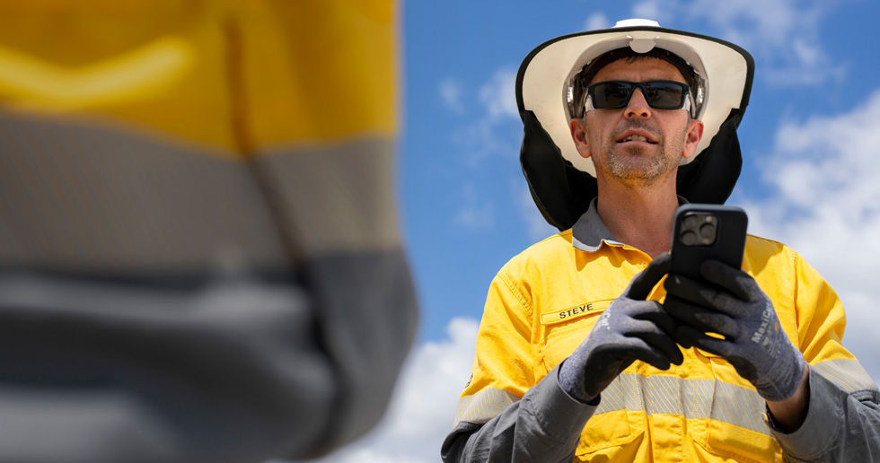 Field workers use iPhone and iPad to assess work sites, collaborate with crew members, and check detailed information across many work site locations