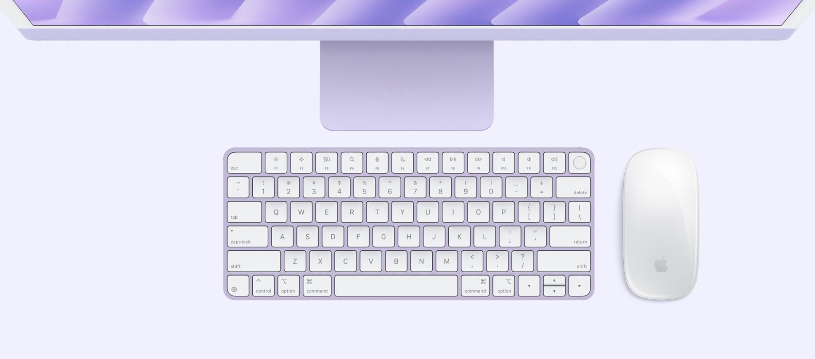 Imagem aérea de um iMac roxo com mouse e keyboard na mesma cor