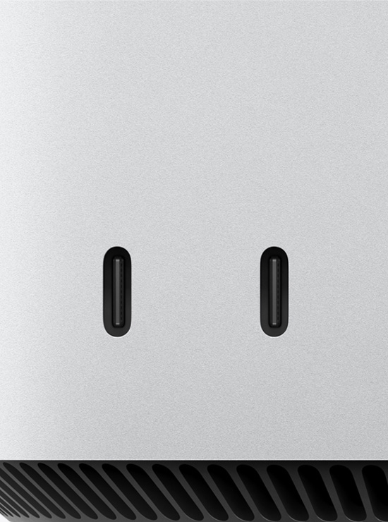 Close das duas portas USB-C na frente do Mac mini.